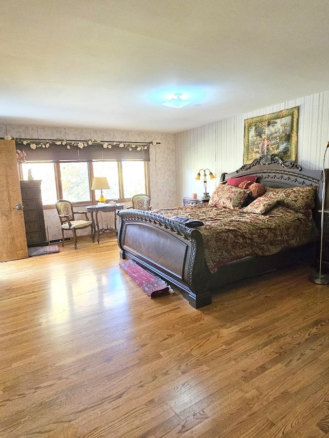 bedroom with wood finished floors