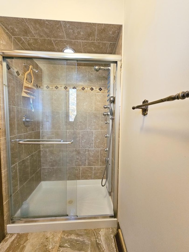 bathroom with a stall shower