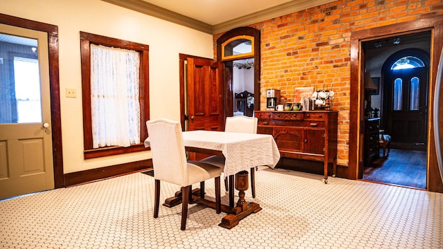 608 E Ash St, Fairbury, IL 61739 - dining area featuring ornamental molding