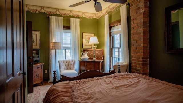 608 E Ash St, Fairbury, IL 61739 - bedroom featuring a ceiling fan and light wood finished floors