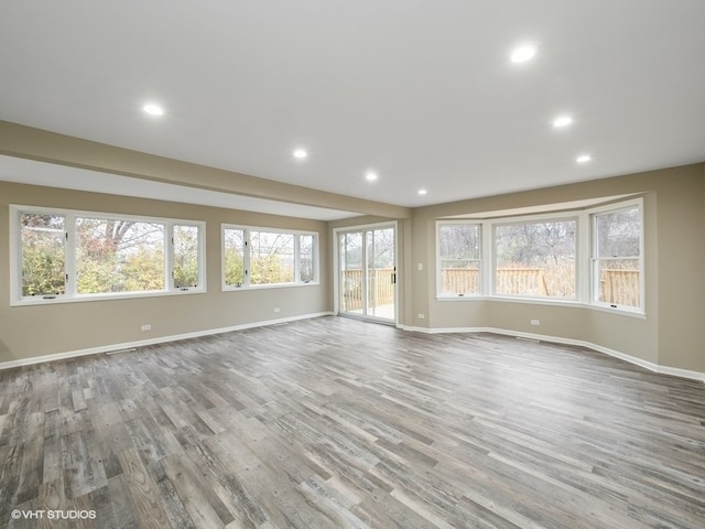 unfurnished living room featuring light hardwood / wood-style flooring