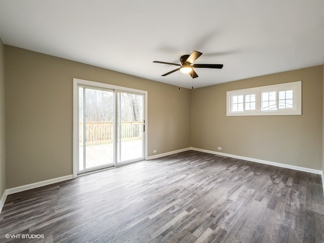 spare room with ceiling fan and hardwood / wood-style floors