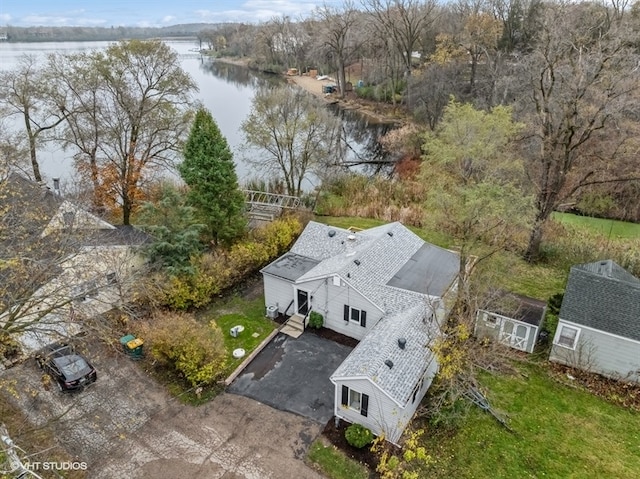 birds eye view of property featuring a water view