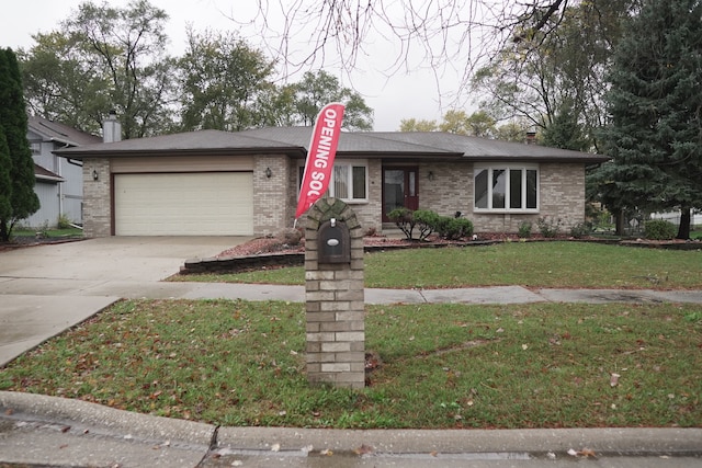 ranch-style home with a garage and a front yard