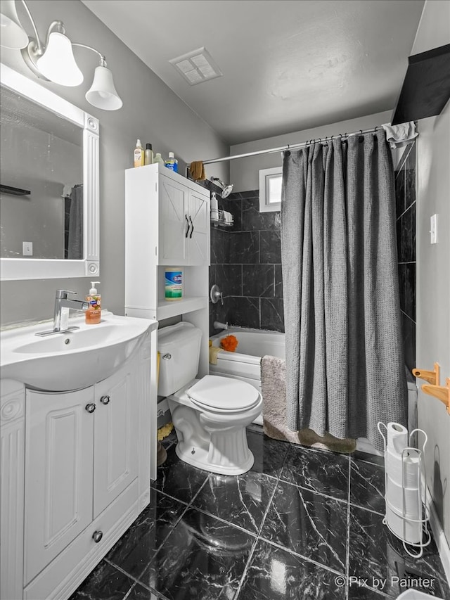 full bathroom with vanity, toilet, and shower / tub combo with curtain