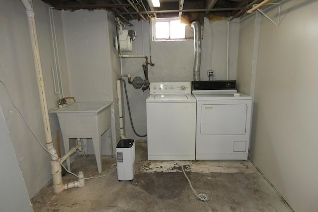 laundry room with washer and clothes dryer