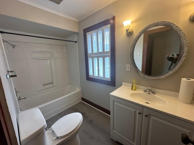 full bathroom with vanity, crown molding, wood-type flooring, washtub / shower combination, and toilet