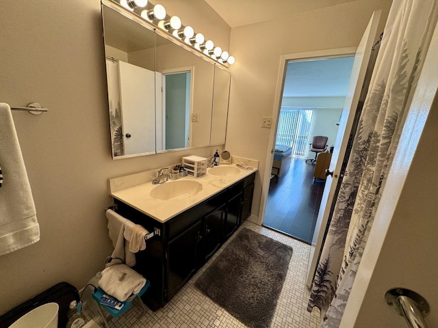 bathroom with vanity and tile patterned flooring