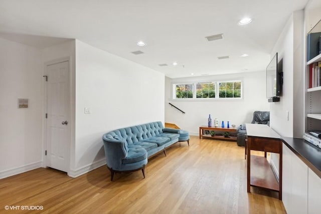 living area featuring light hardwood / wood-style floors