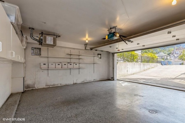 garage featuring a garage door opener