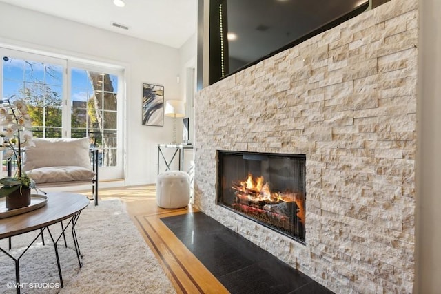 interior space featuring a stone fireplace