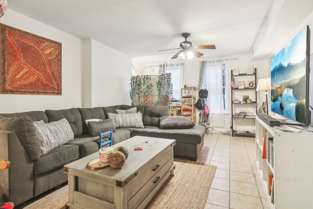 tiled living room featuring ceiling fan