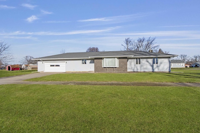 single story home with a garage and a front lawn