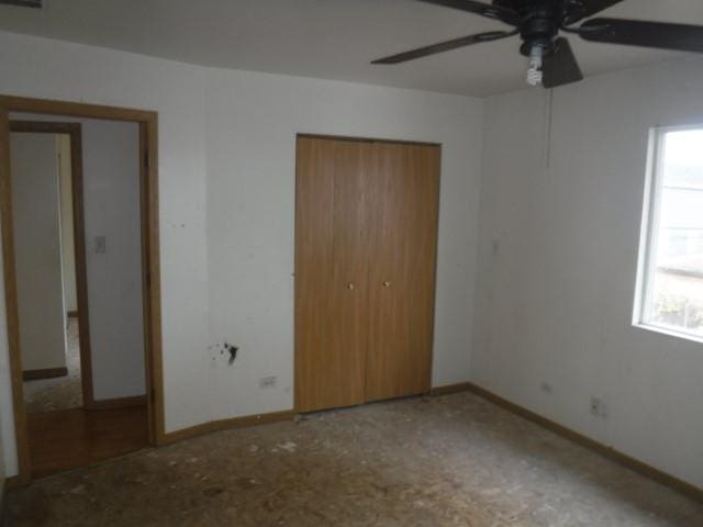 unfurnished bedroom with ceiling fan