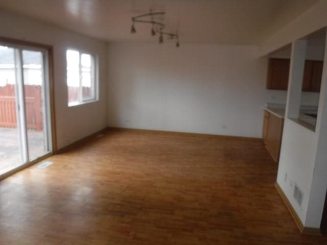 unfurnished dining area featuring hardwood / wood-style flooring