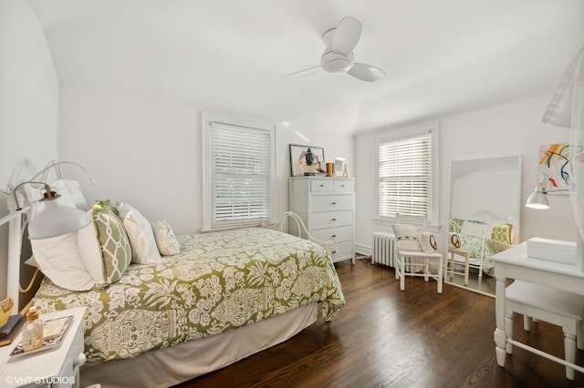 bedroom featuring ceiling fan and dark wood-type flooring