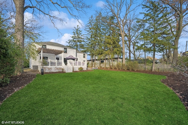 view of yard featuring a wooden deck