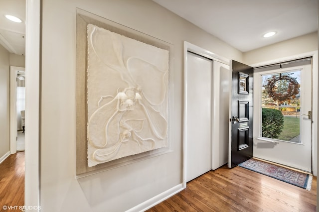 interior space with hardwood / wood-style flooring