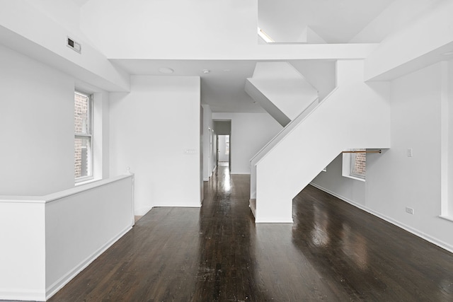 interior space with dark hardwood / wood-style floors