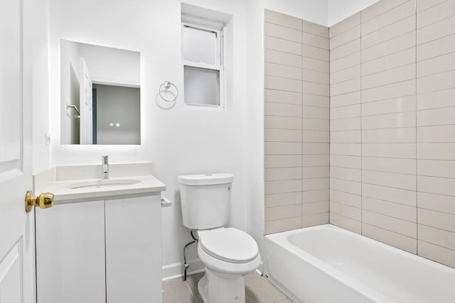 full bathroom with toilet, vanity, tiled shower / bath, and tile patterned flooring