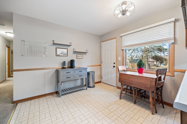 view of carpeted dining space