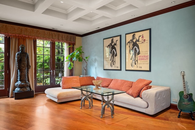 living room with french doors, crown molding, beam ceiling, coffered ceiling, and light hardwood / wood-style flooring