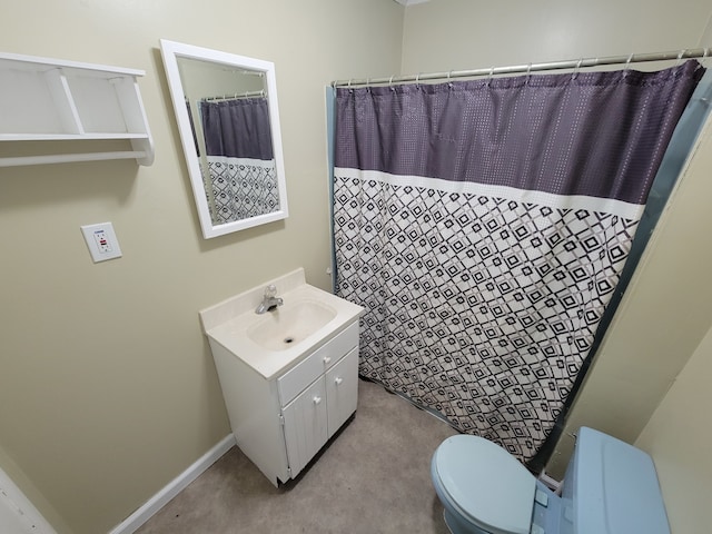 bathroom with vanity, toilet, and a shower with curtain