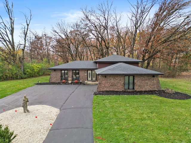 prairie-style house with a front yard