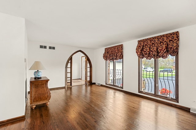 unfurnished room featuring hardwood / wood-style floors