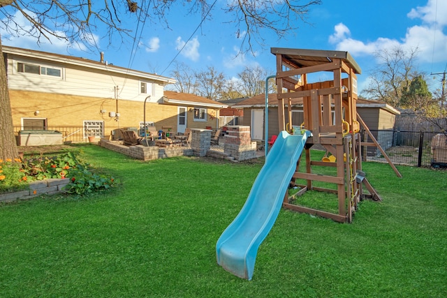 view of playground with a yard