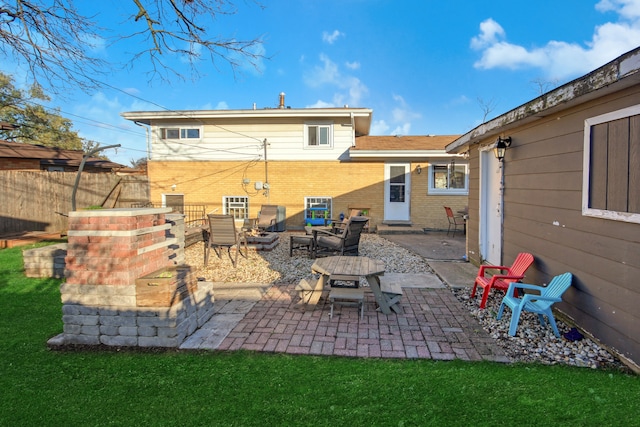 rear view of property featuring a patio