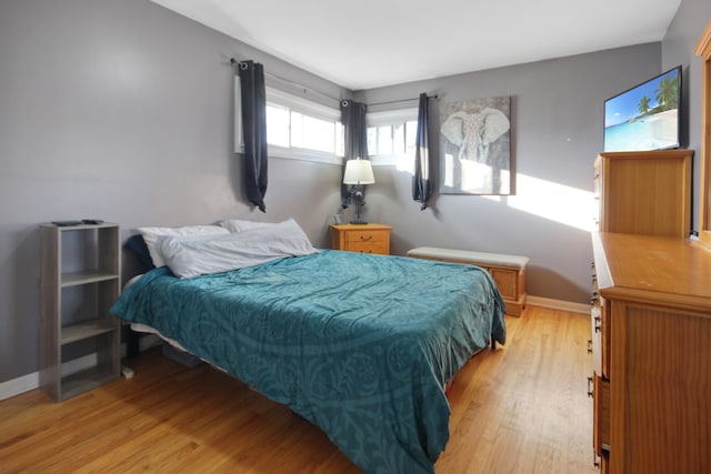 bedroom with light hardwood / wood-style floors