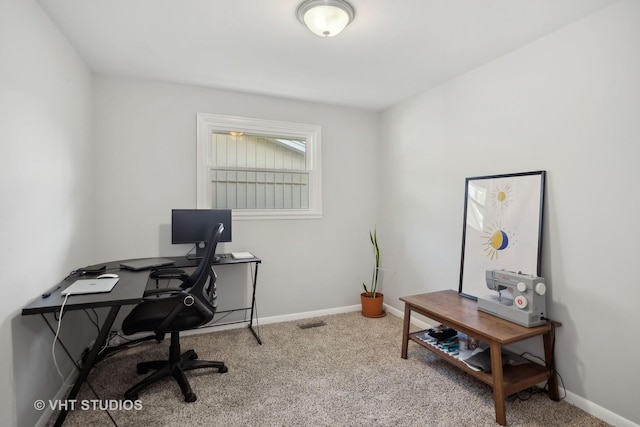 office space with light colored carpet