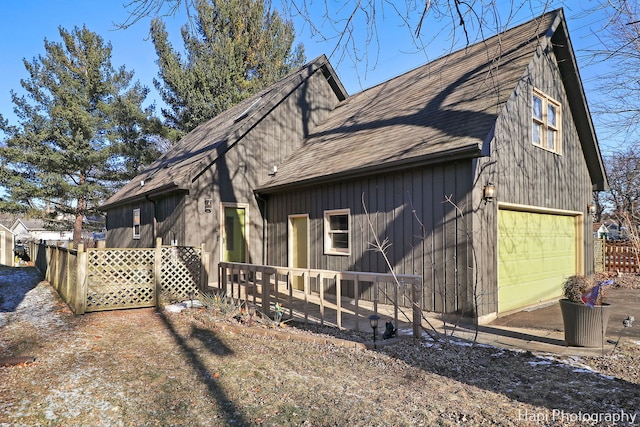 view of home's exterior featuring a garage