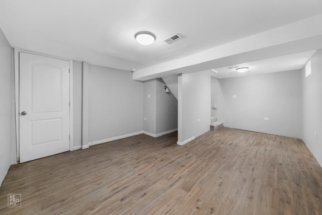 basement featuring light wood-type flooring