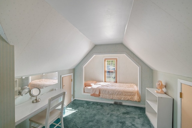 bedroom featuring carpet floors and vaulted ceiling