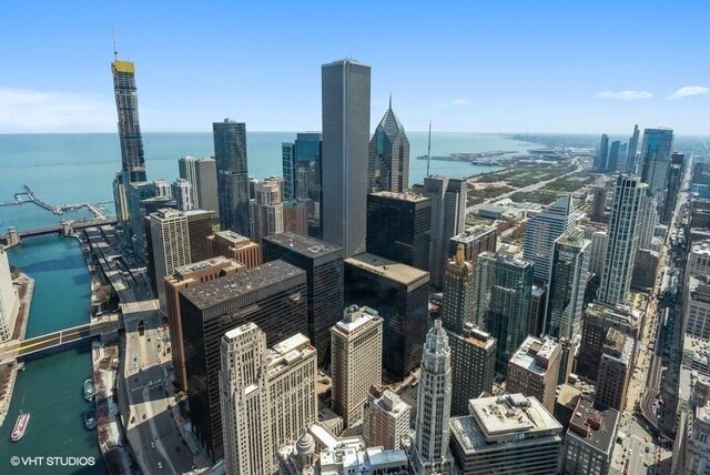 property's view of city with a water view