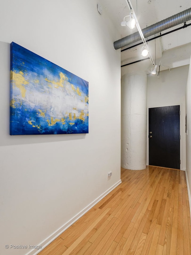 unfurnished room featuring hardwood / wood-style floors