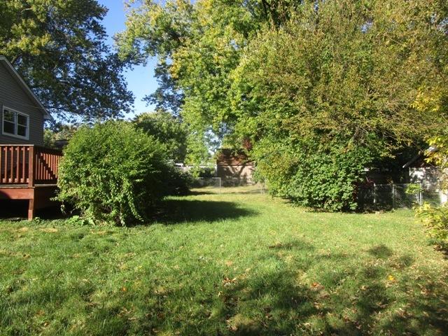 view of yard with a deck