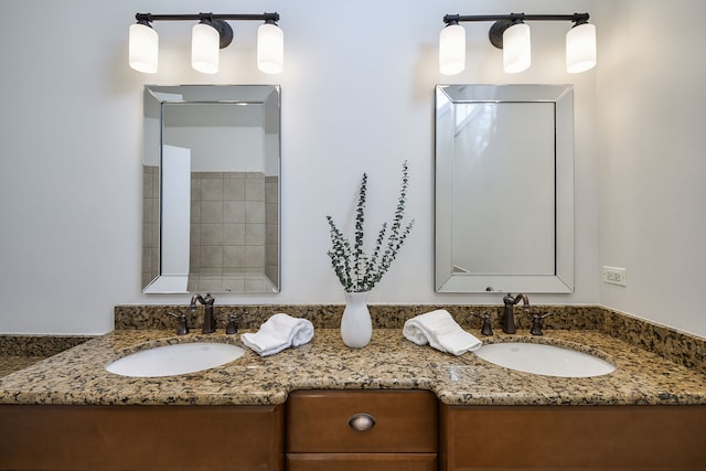 bathroom with double vanity and a sink