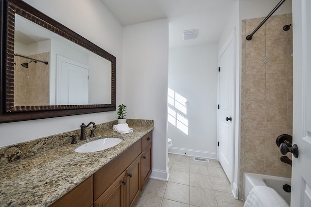 bathroom with tile patterned floors, visible vents, toilet, and vanity