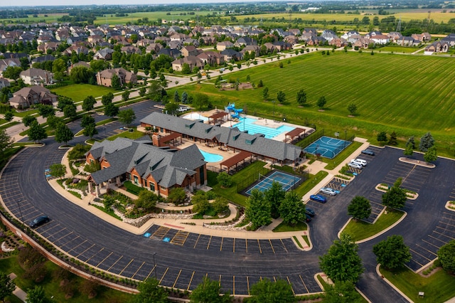 birds eye view of property with a residential view