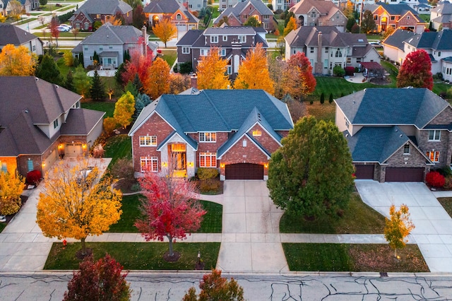 birds eye view of property with a residential view