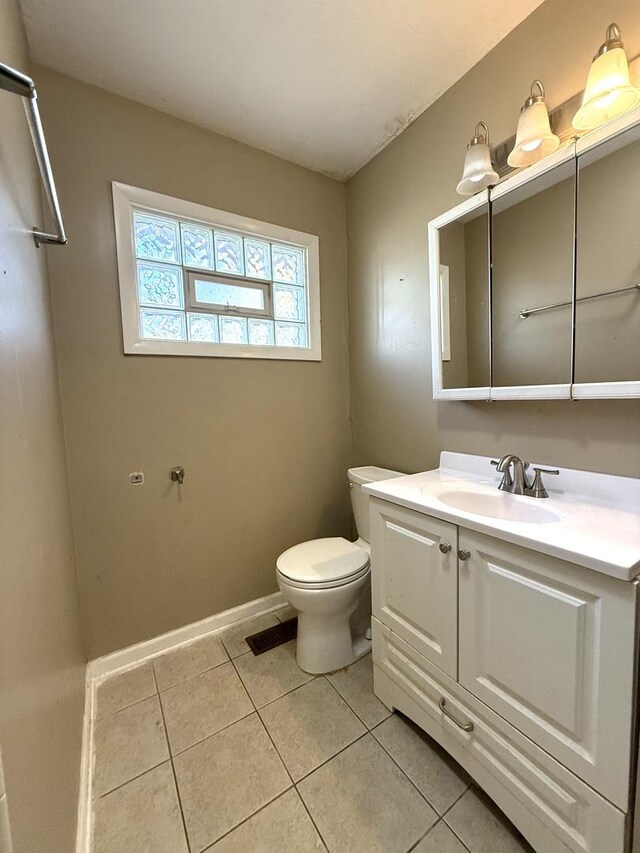 450 Shabbona Dr, Park Forest, IL 60466 - bathroom with tile patterned flooring and vanity