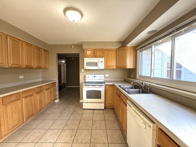 450 Shabbona Dr, Park Forest, IL 60466 - kitchen featuring white appliances, light countertops, and light tile patterned floors