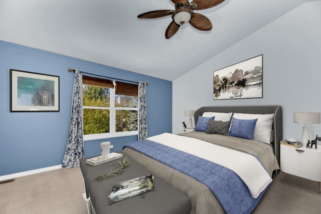 bedroom featuring carpet, ceiling fan, and vaulted ceiling