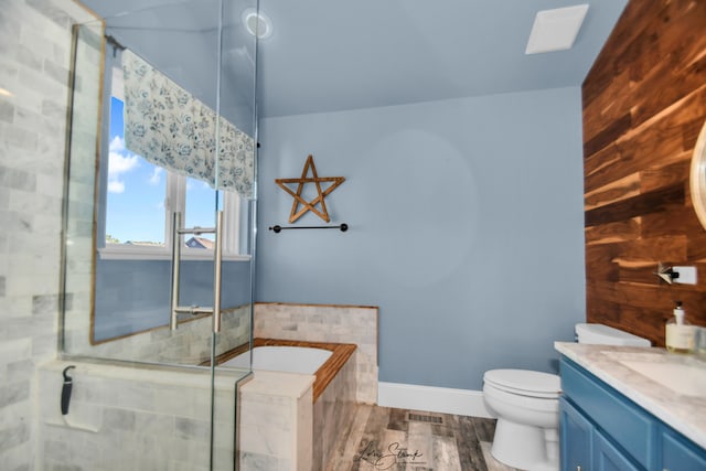 17828 S Mitchell Ln, Lockport, IL 60441 - bathroom featuring toilet, vanity, a bath, a shower with shower door, and baseboards