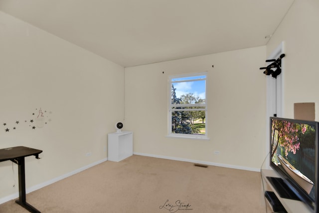 view of carpeted spare room