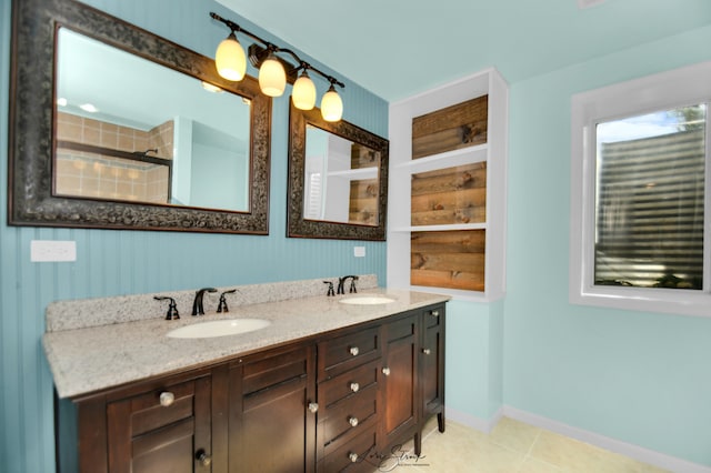 17828 S Mitchell Ln, Lockport, IL 60441 - bathroom featuring tile patterned floors, double vanity, and baseboards