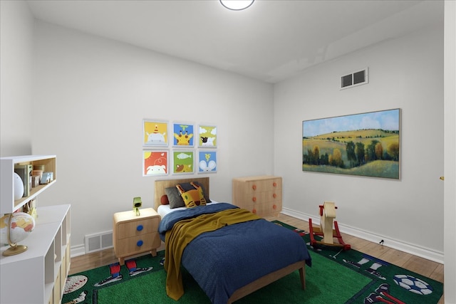 bedroom with hardwood / wood-style flooring